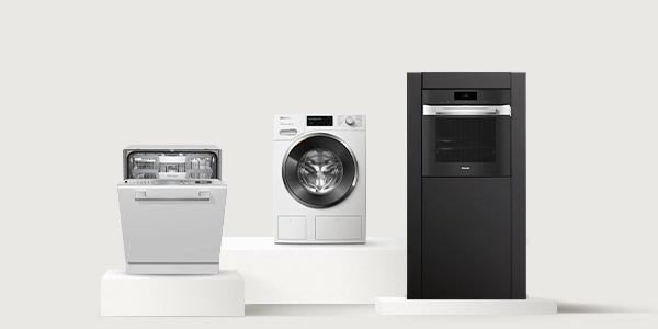 Miele dishwasher, washing machine and oven displayed side by side