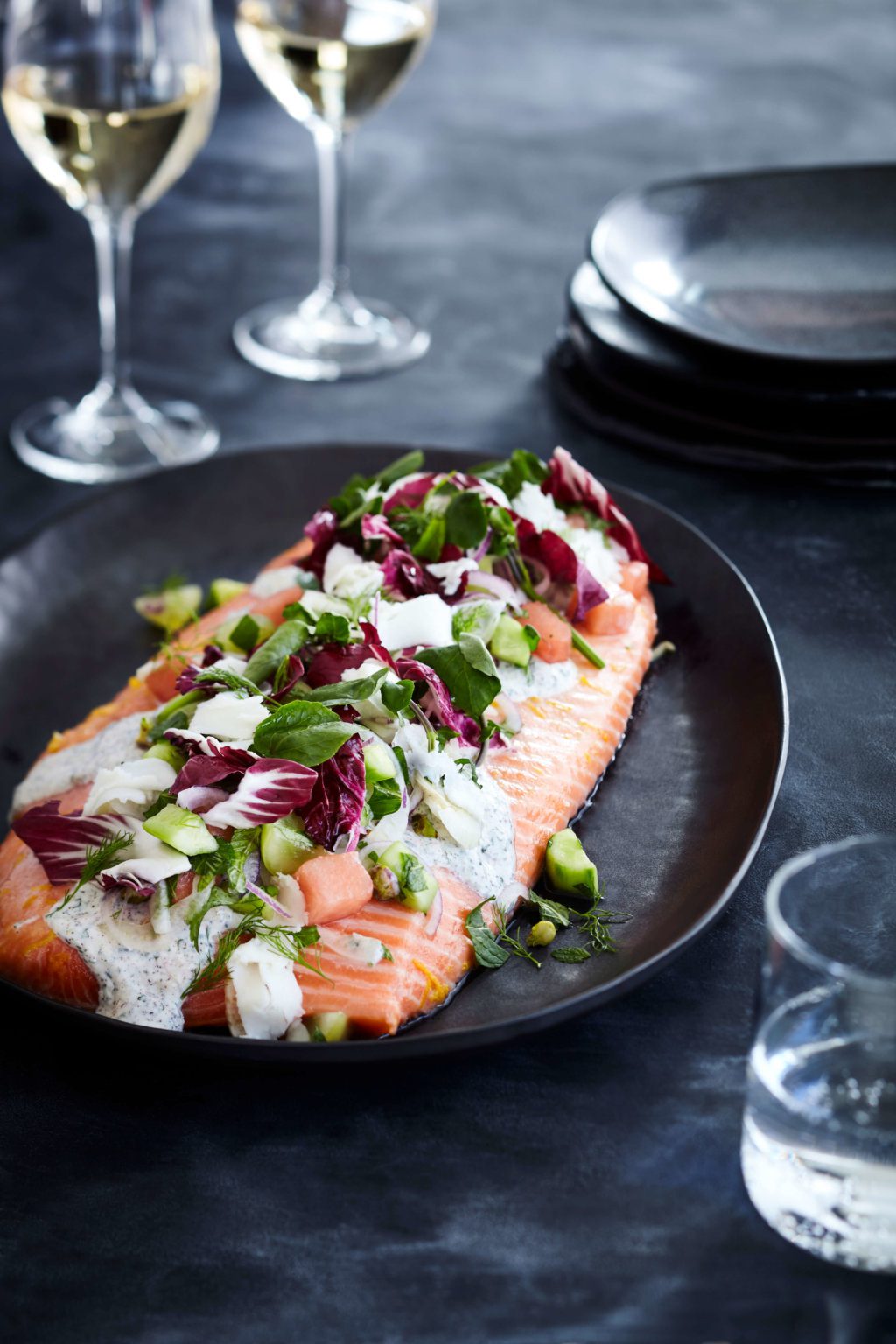 Slow baked king salmon, yoghurt dressing with melon and pomegranate