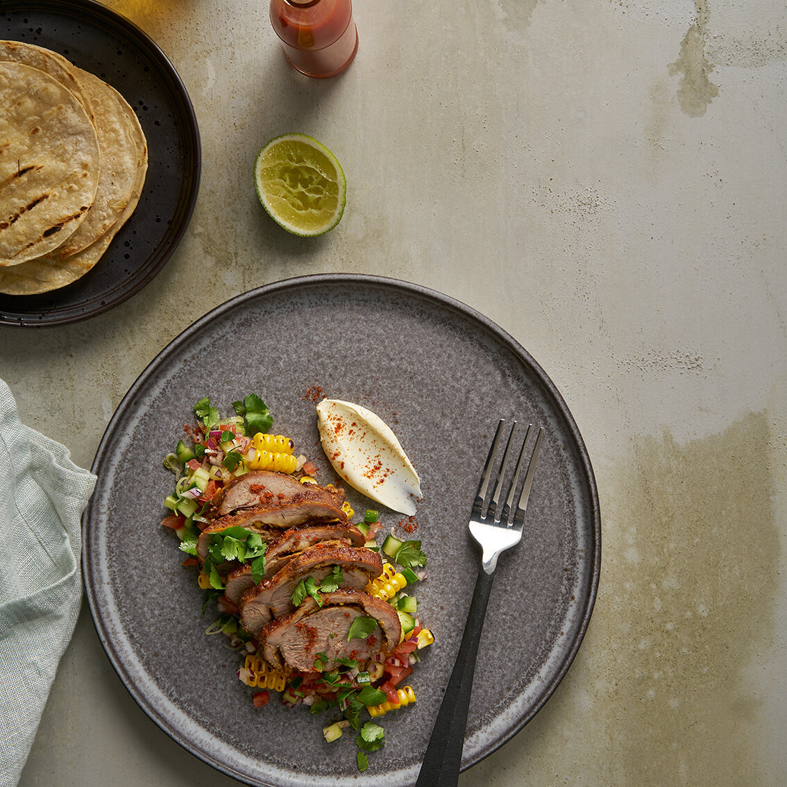 Tamarind, lime and chipotle pork, with corn salsa Miele Experience Centre