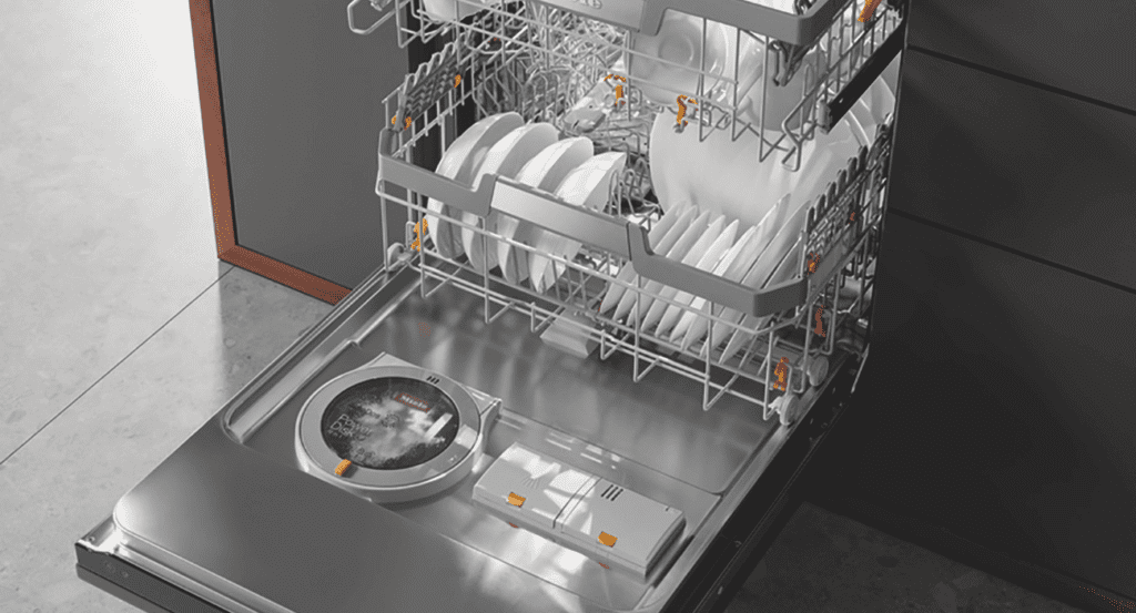 stacked dishes in a Miele dishwasher